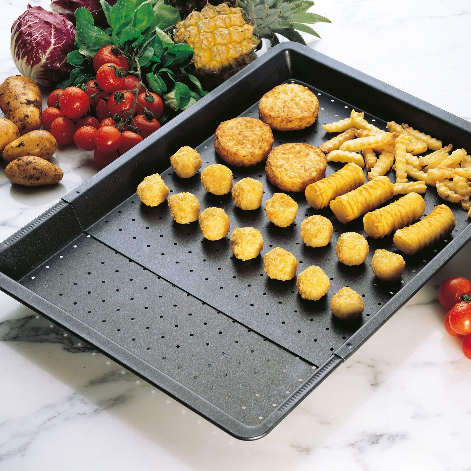 Bakeplate perforert uttrekkbar 37-52 cm non-stick - Zenker nærbilde av perforering