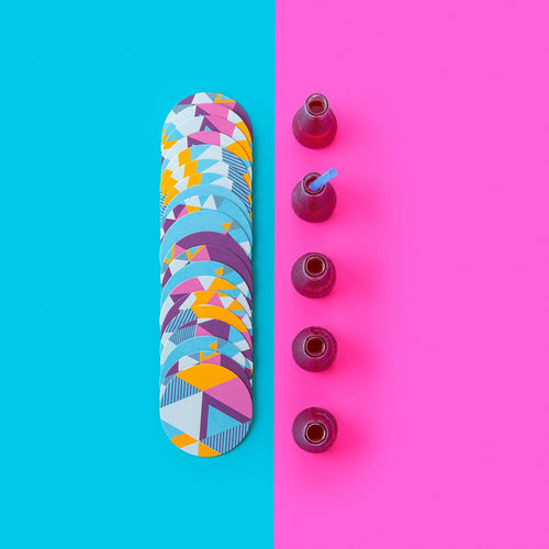 Drikkebrikker papp Ø10,7 cm 4 design 20 stk - Tasty bakside