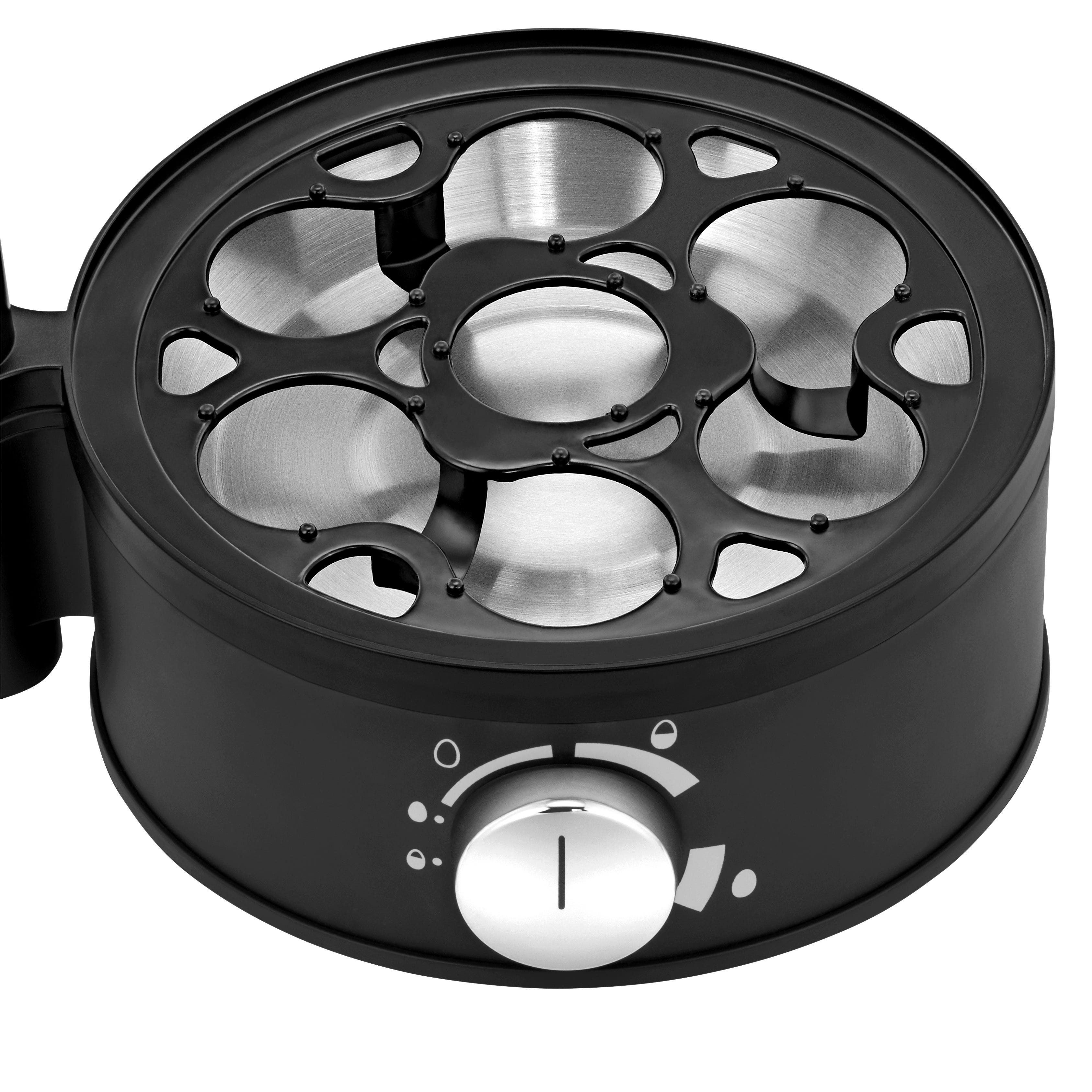 Nærbilde av eggprikker på Eggkoker Stelio for 7 egg rustfritt stål