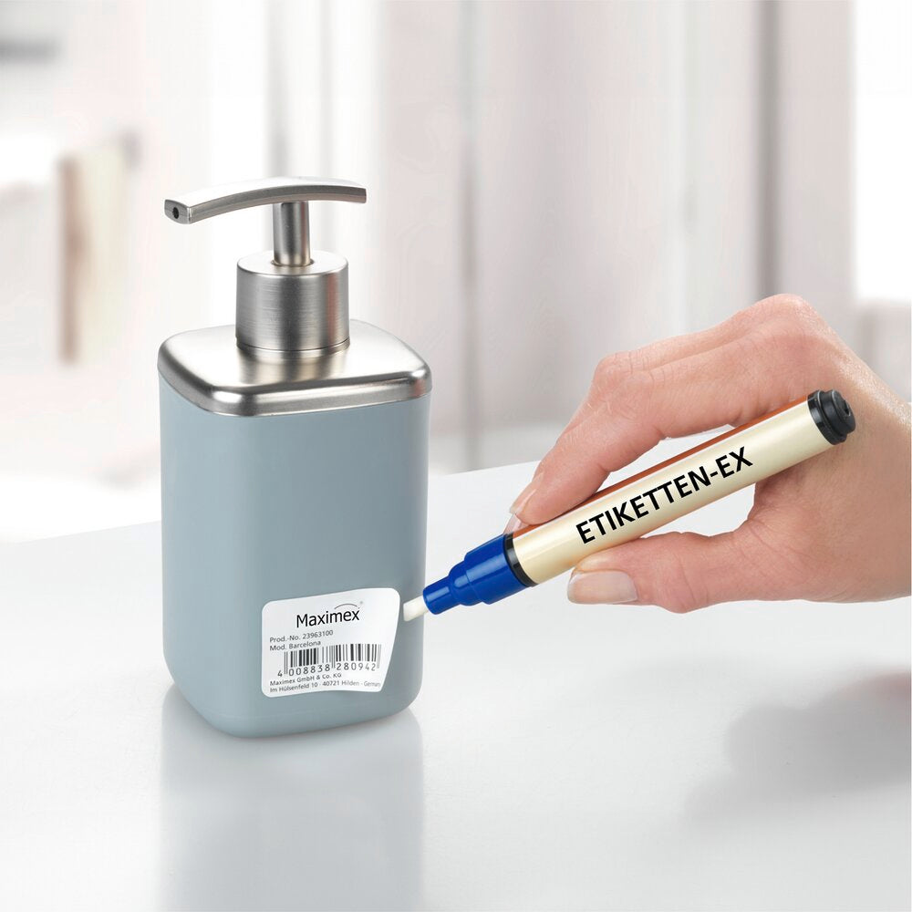 Bruk av Etikett-fjerner spray svart - Wenko på flate
