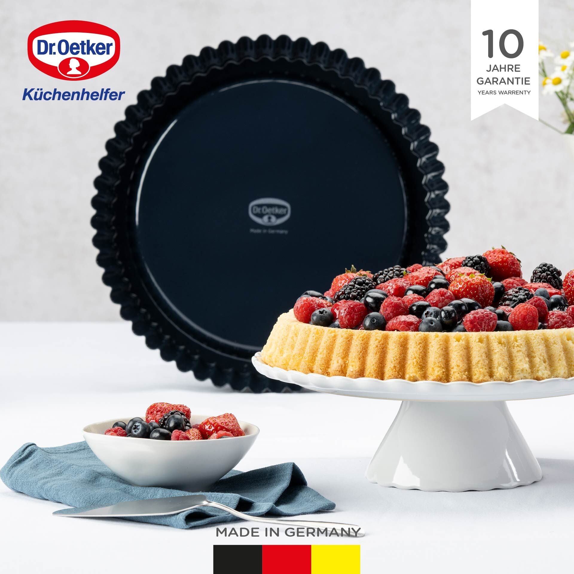 Nærbilde av kvarts-emaljert overflate på Fruktkakeform emaljert Ø28 cm PFAS-fri - Dr. Oetker