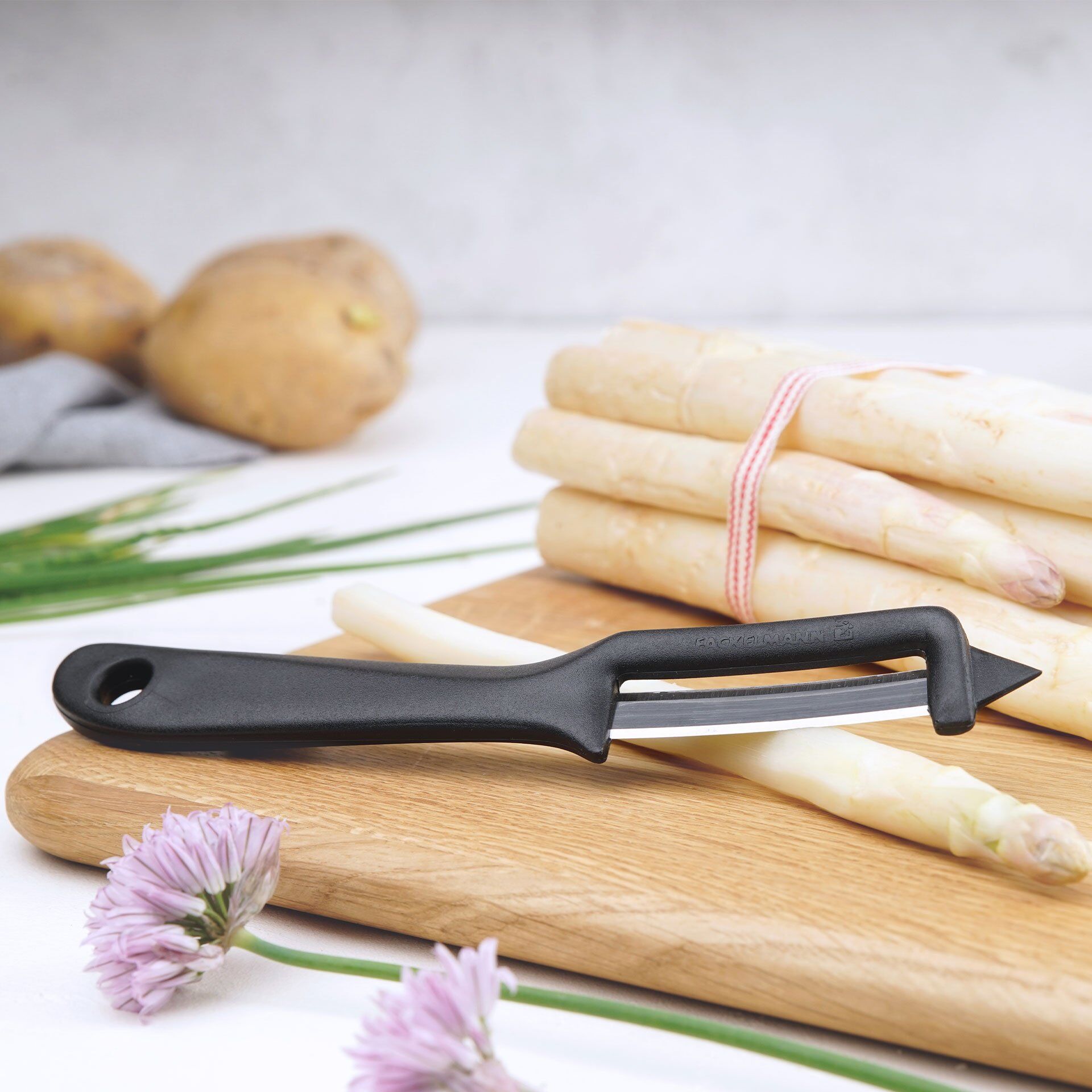 Grønnsaksskreller 18 cm med rustfritt stål-blad bakside