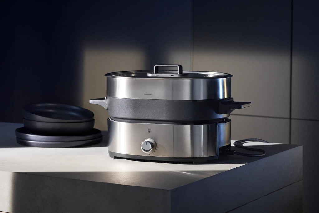 To Cromargan®-innsatser i Hot pot og dampkoker med non-stick og tilbehør - WMF Lono