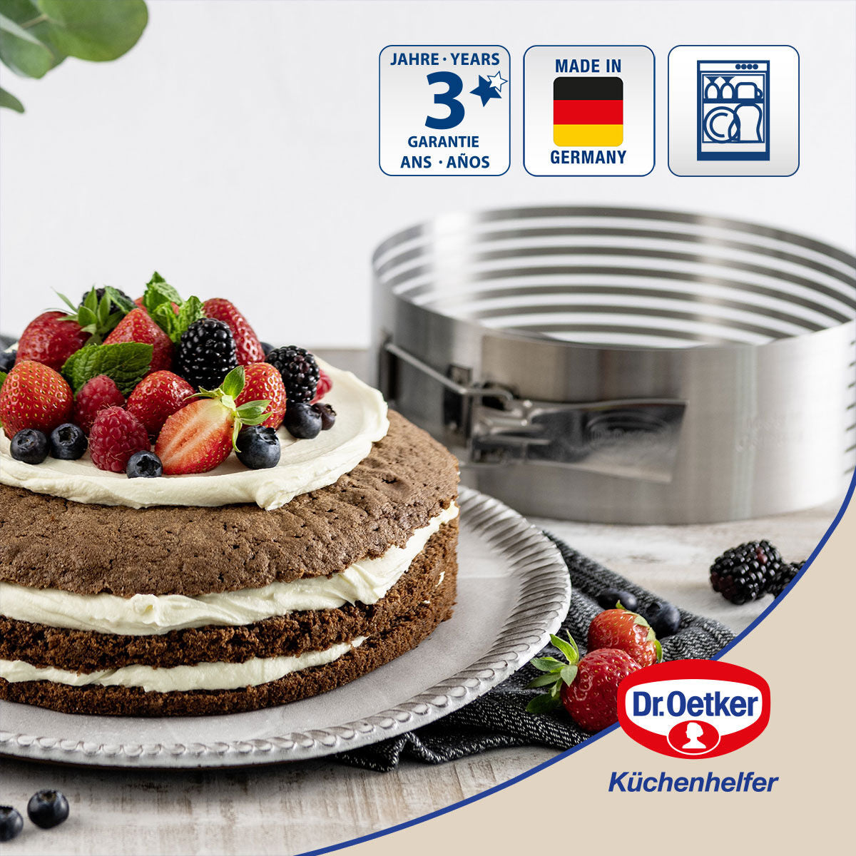 Detalj av kakebunnskjærer med kakekniv rustfritt stål Dr. Oetker
