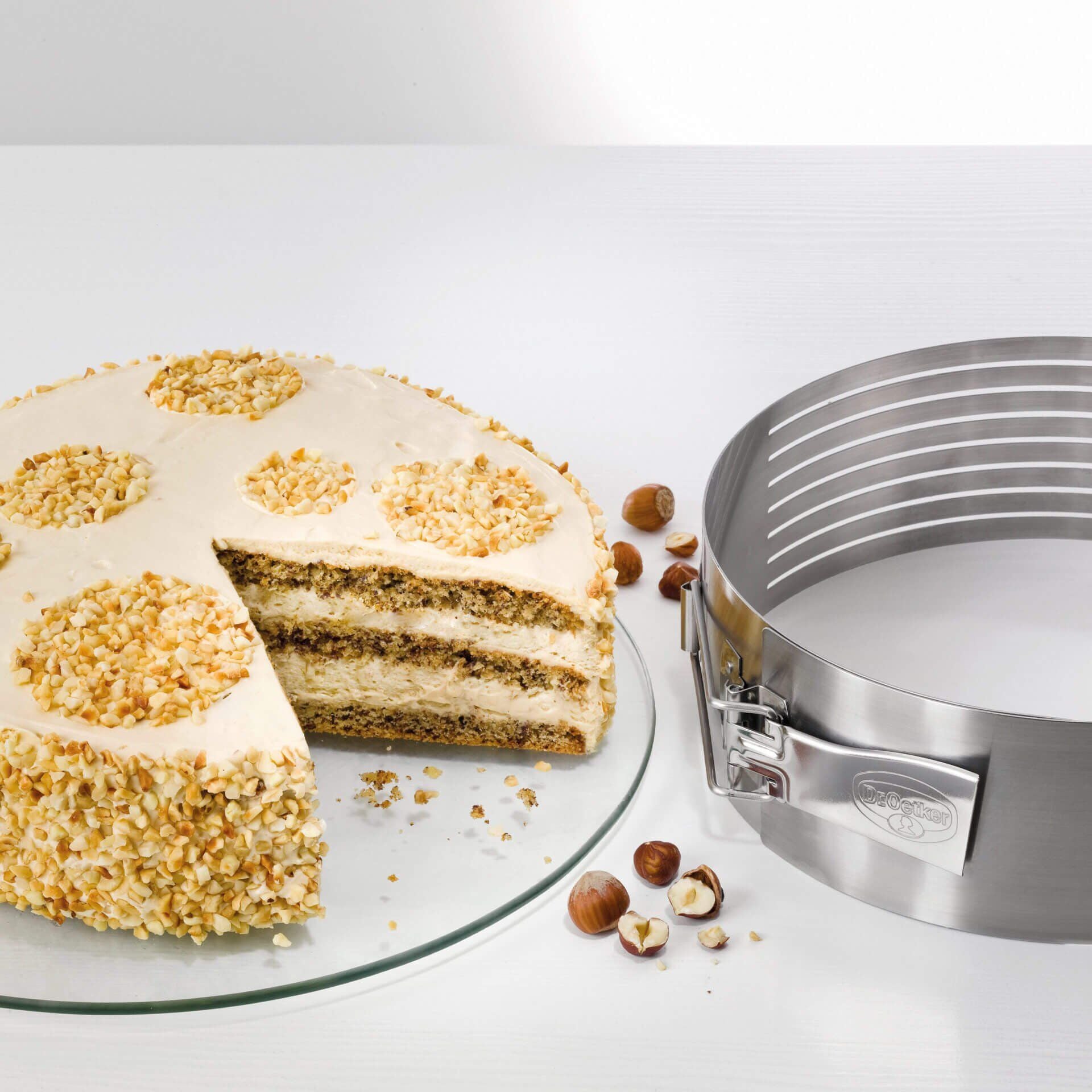 Kakebunnskutter justerbar Ø26-28 cm rustfritt stål - Dr. Oetker bakside
