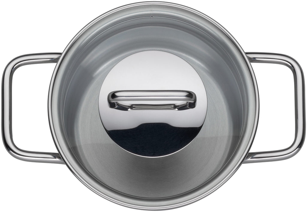 Kjele 12 cm rustfritt stål med glasslokk Extra Cook Mini montert på kokeplate