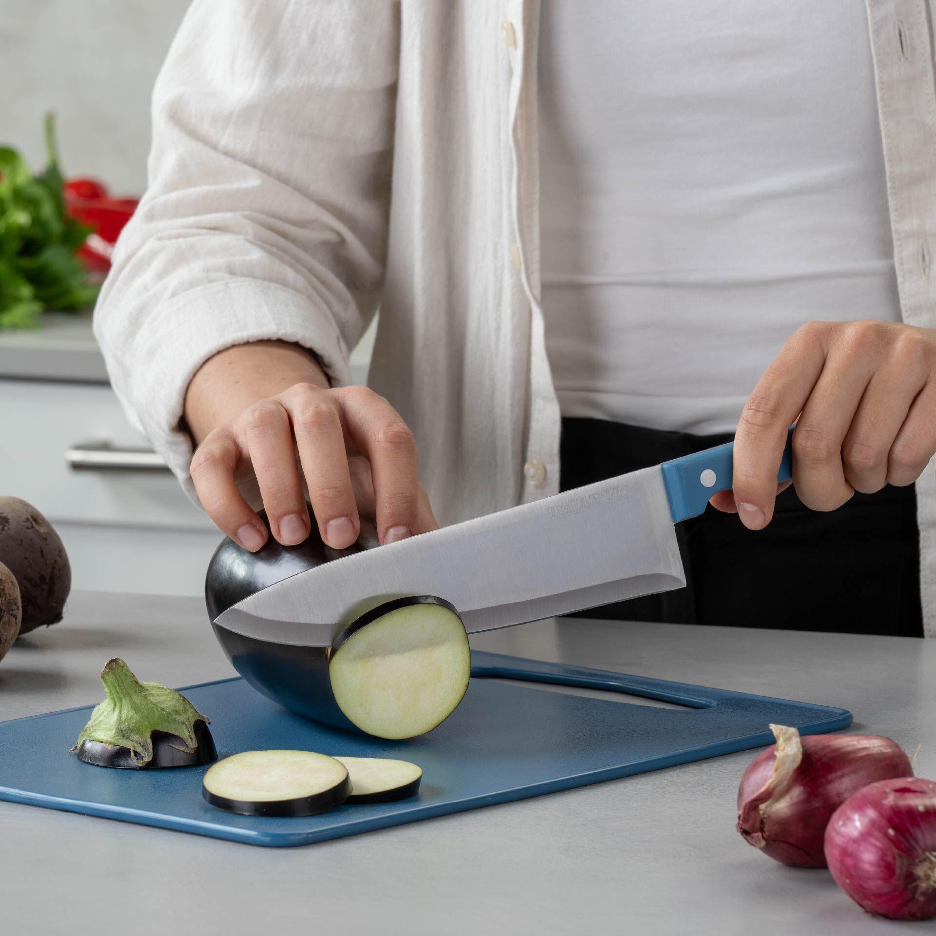 Kokkekniv blå 20 cm rustfritt stål - Fackelmann bakside