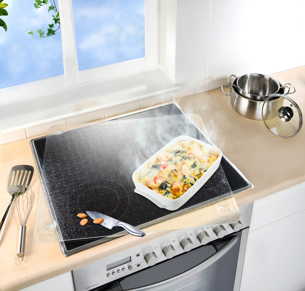 Nærbilde av overflate på Komfyrdeksel glass universal 3-i-1 50×56 cm gjennomsiktig