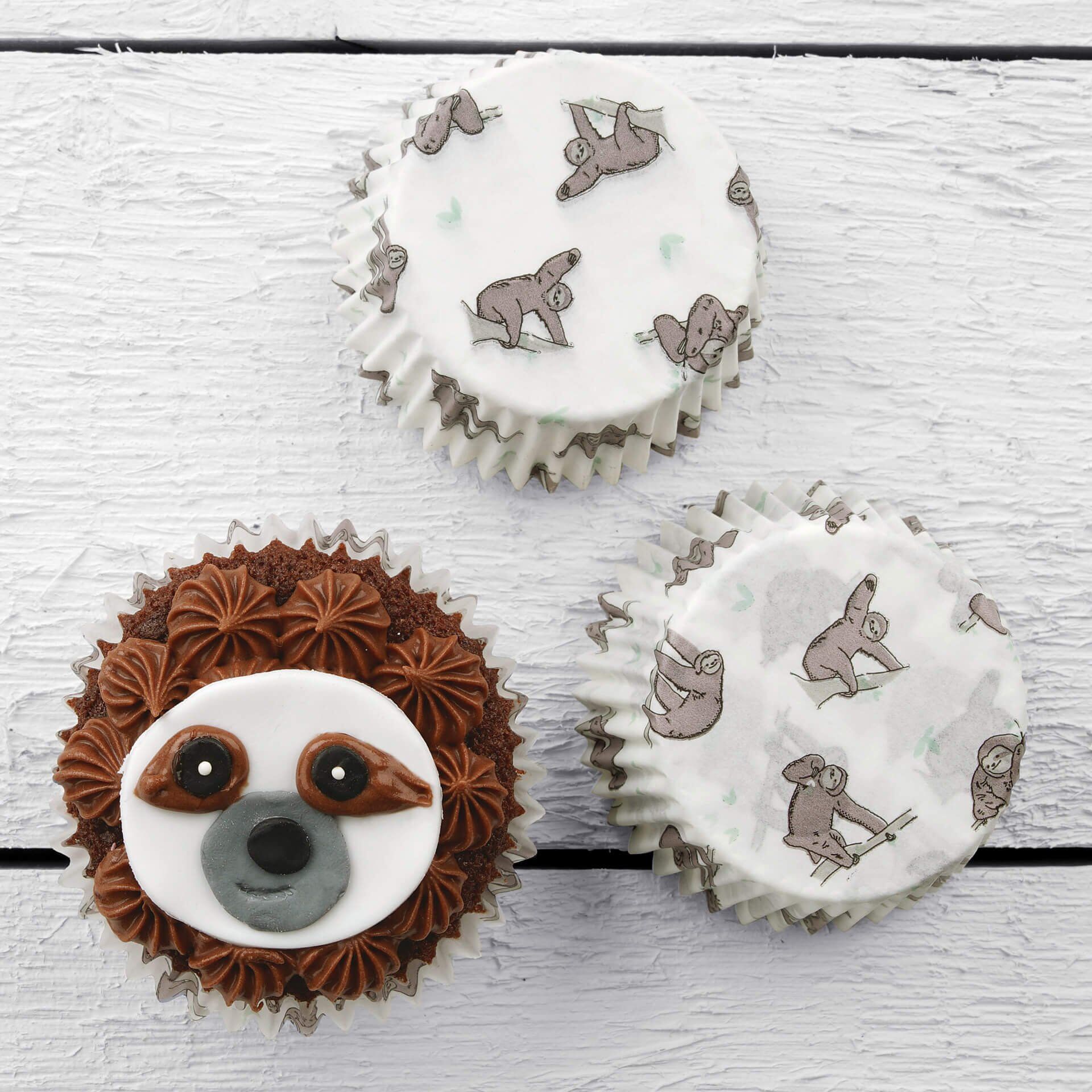 Muffinsformer papir dovendyr 50 stk Ø5 cm Zenker montert i muffinsbrett