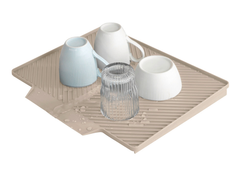 Oppvaskmatte Nelia beige plast sammenrullet