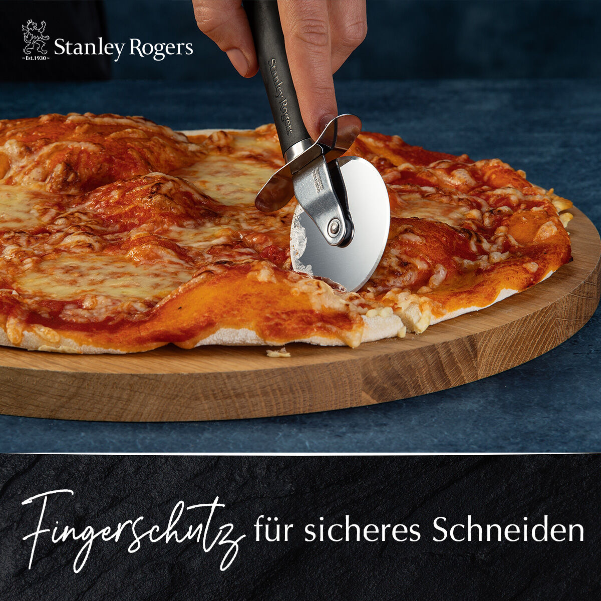 Pizzahjul 18 cm rustfritt stål med fingerbeskyttelse detalj av håndtak