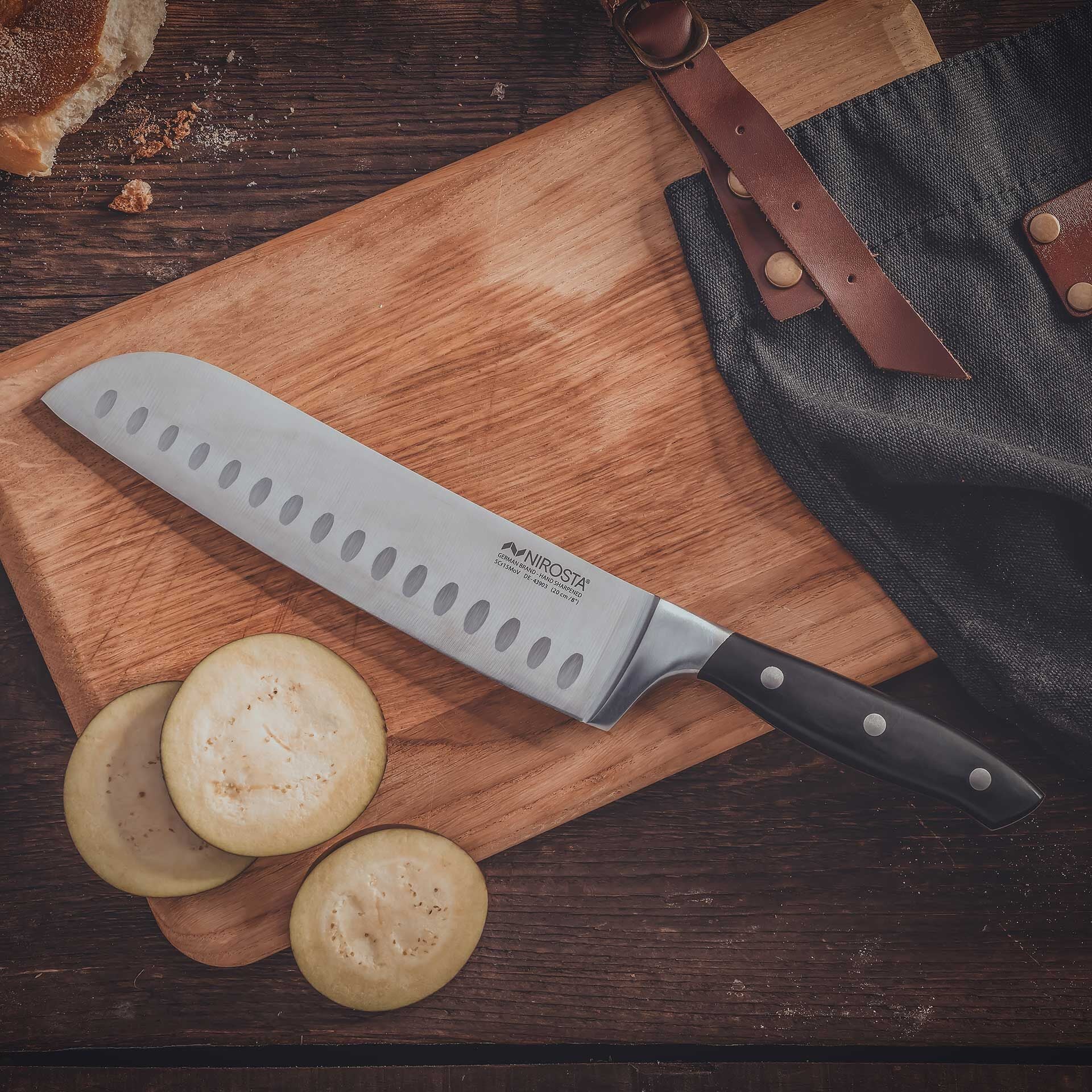 Santokukniv Trinity 20 cm rustfritt stål med kulleslip bakside
