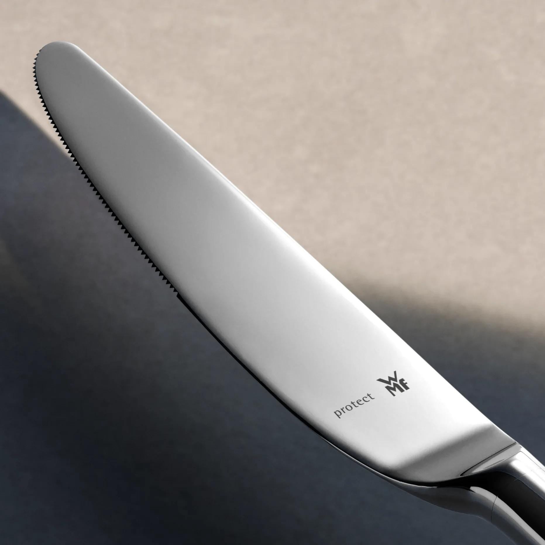 Sentic middagskniv polert Cromargan protect rustfritt stål - WMF montert på bord