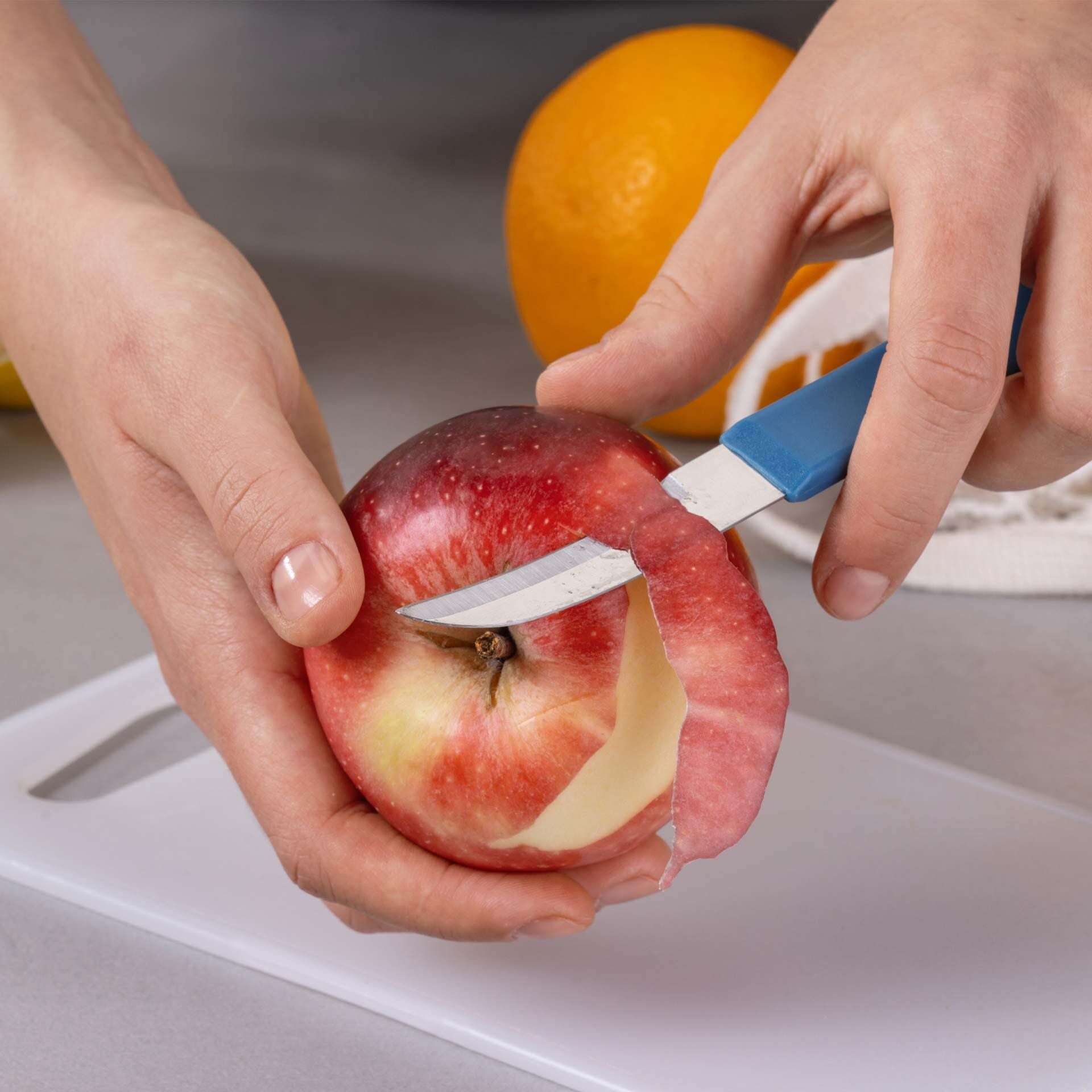 Skreller Essential 16,5 cm blå rustfritt stål bakside