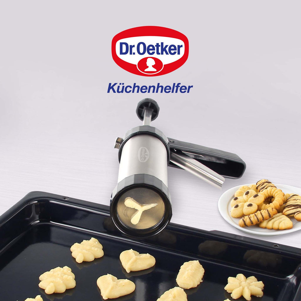Småkakepresse med 12 formskiver 13-delt sett - Dr. Oetker detalj av håndtak