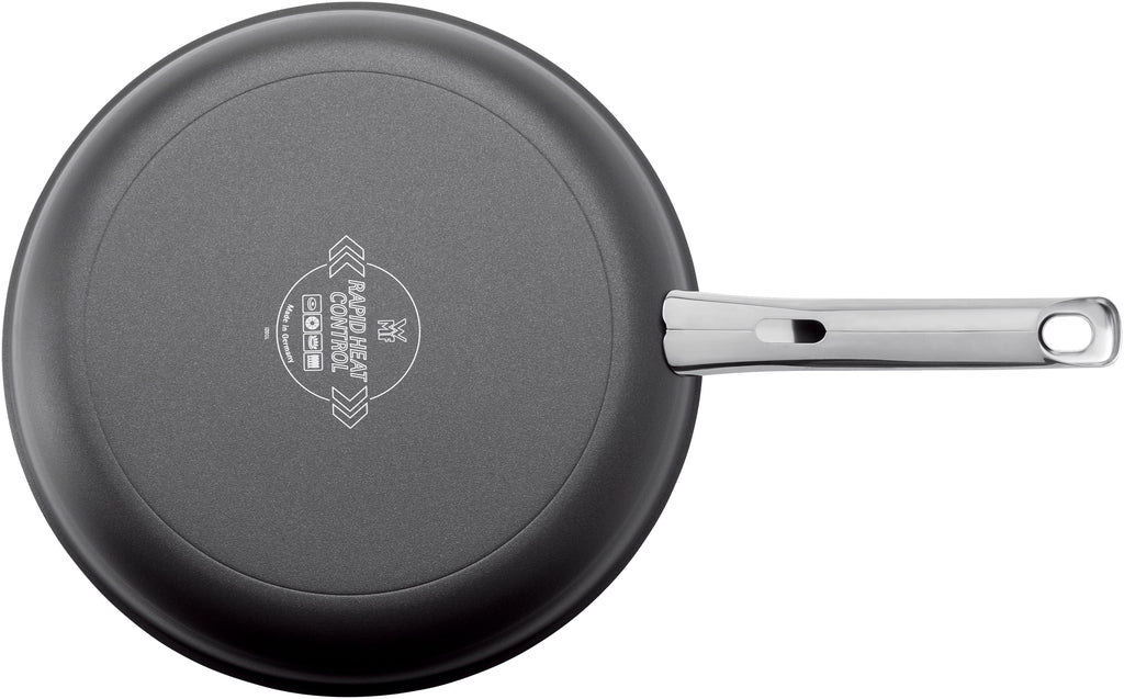 Steak Profi stekepanne 28 cm non-stick induksjon i bruk på induksjonstopp