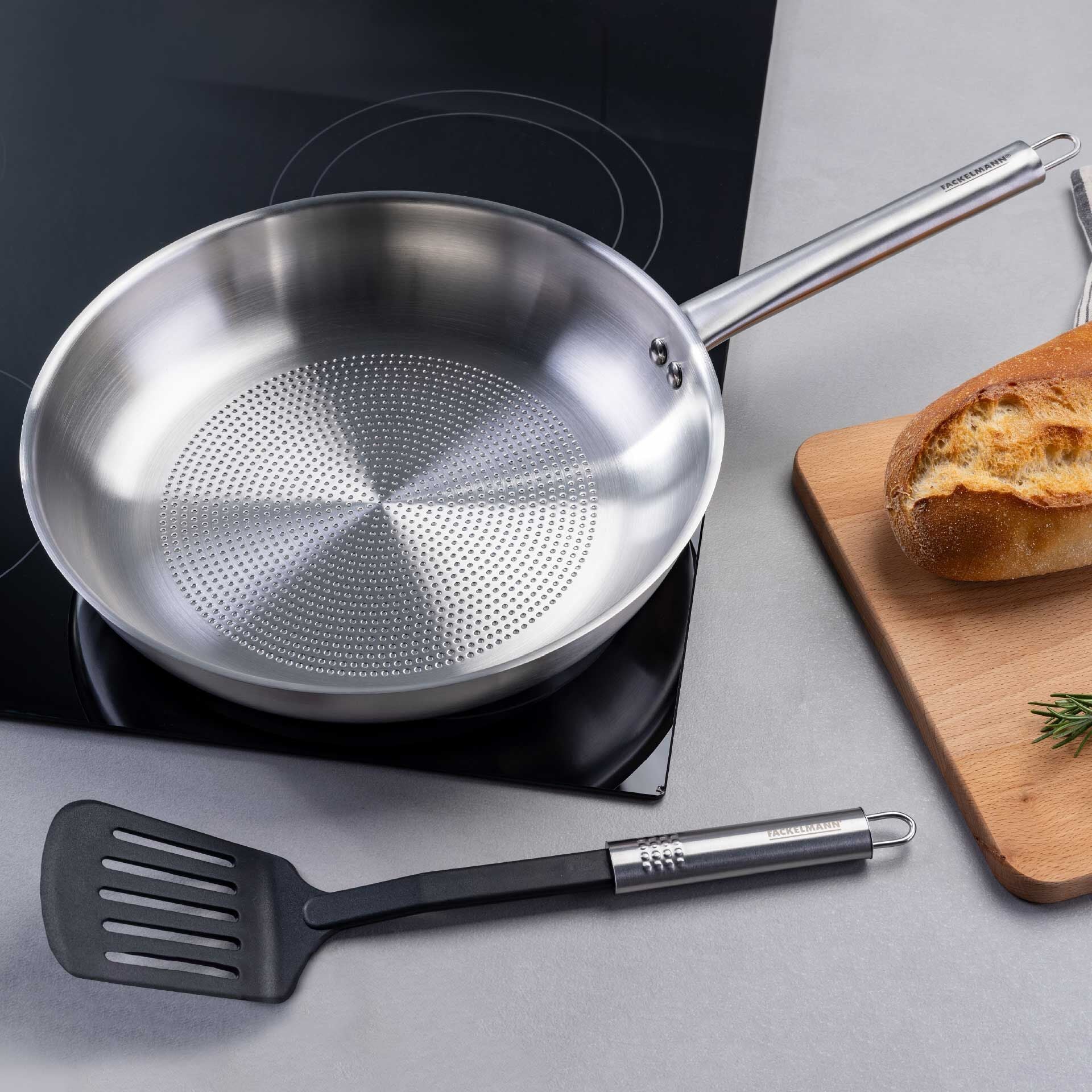 Stekepanne rustfritt stål Ø28 cm med ovalt håndtak bakside