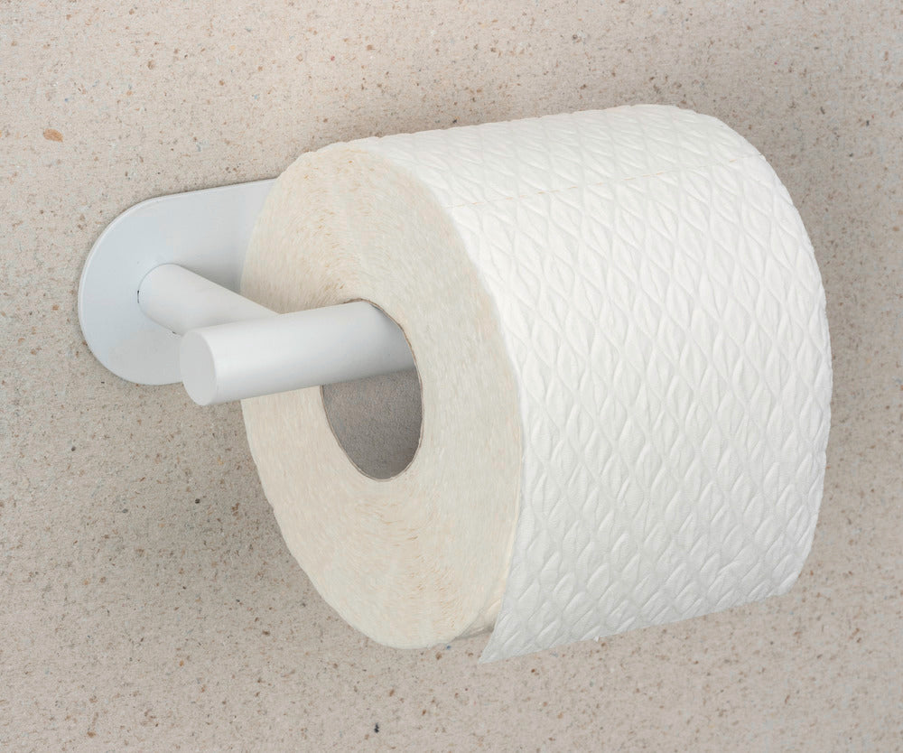 Nærbilde av overflate på Turbo-Loc® Orea toalettpapirholder hvit matt rustfritt stål