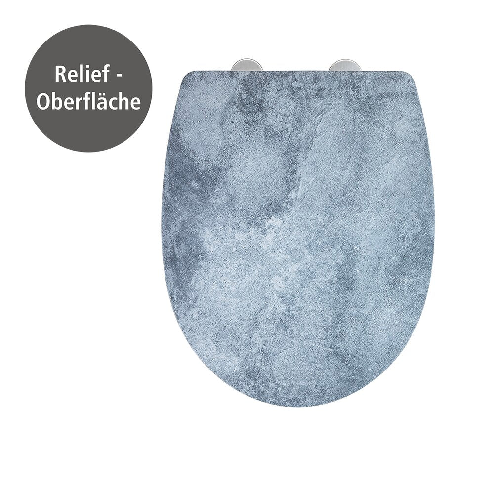 Toalettsete Cement med relieff og soft close termoplast sett fra siden