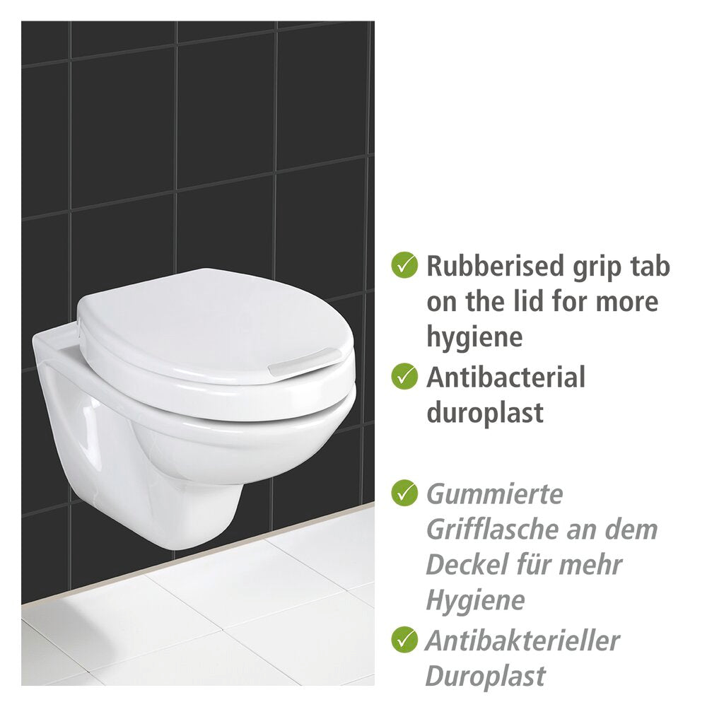 Nærbilde av hengsler på Toalettsete Secura Comfort duroplast med seteforhøyning hvit