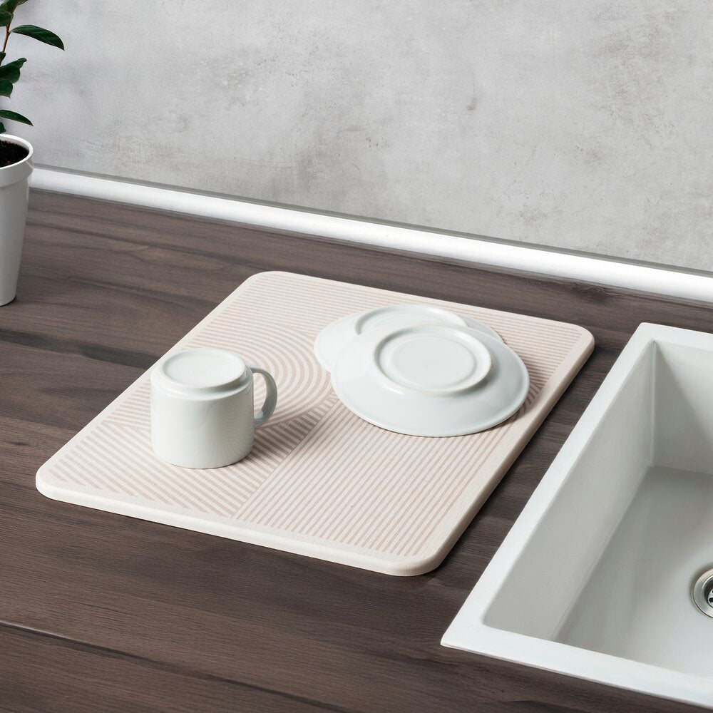 Nærbilde av tørkeplate diatomitt beige 40x30 cm hurtigtørkende tekstur