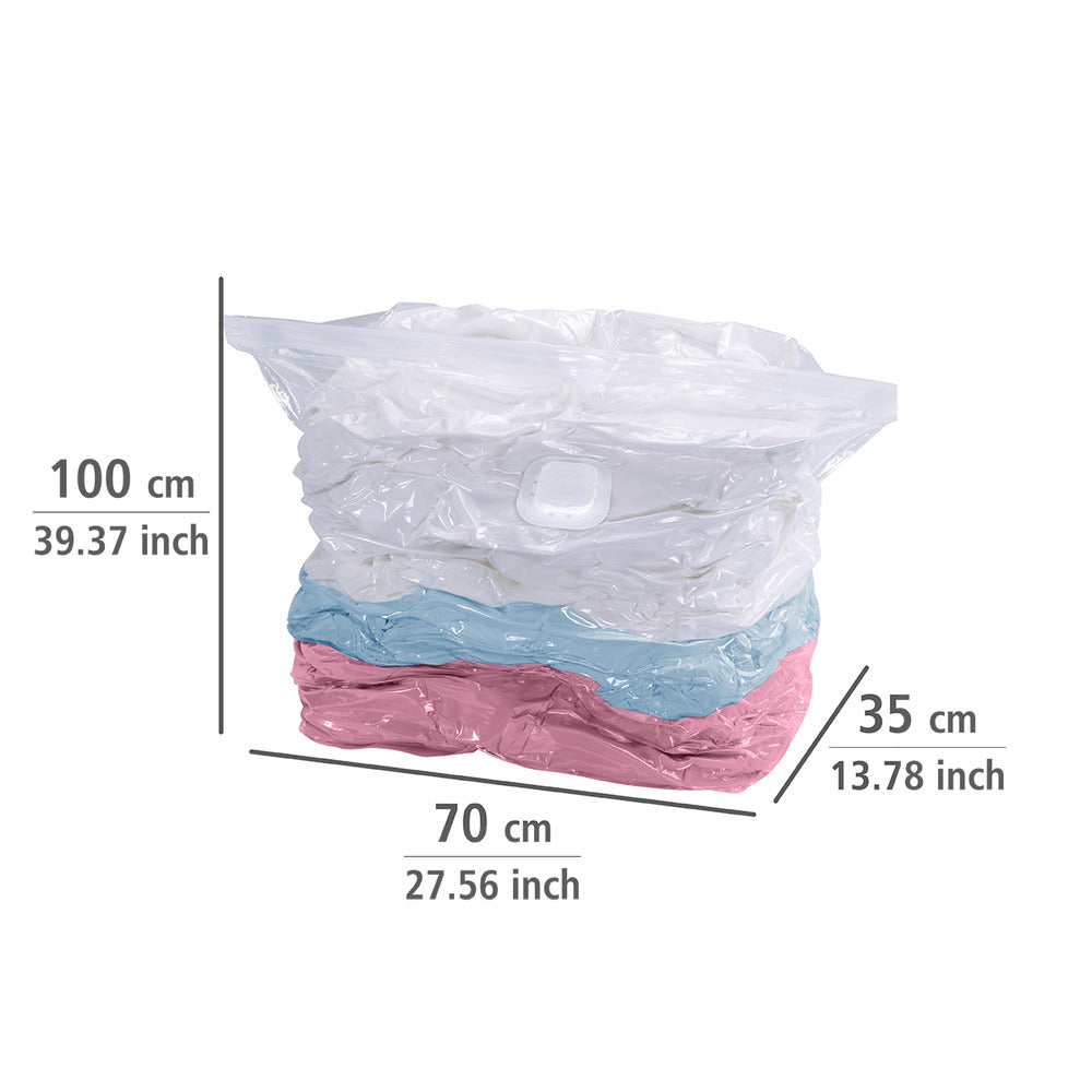 Vakuumpose cube sett 4-delt 2x S og 2x L plast - WENKO i bruk med støvsuger