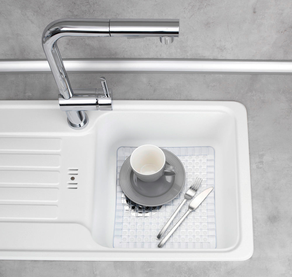 Detalj av transparent vaskmatte 31×26,5 cm