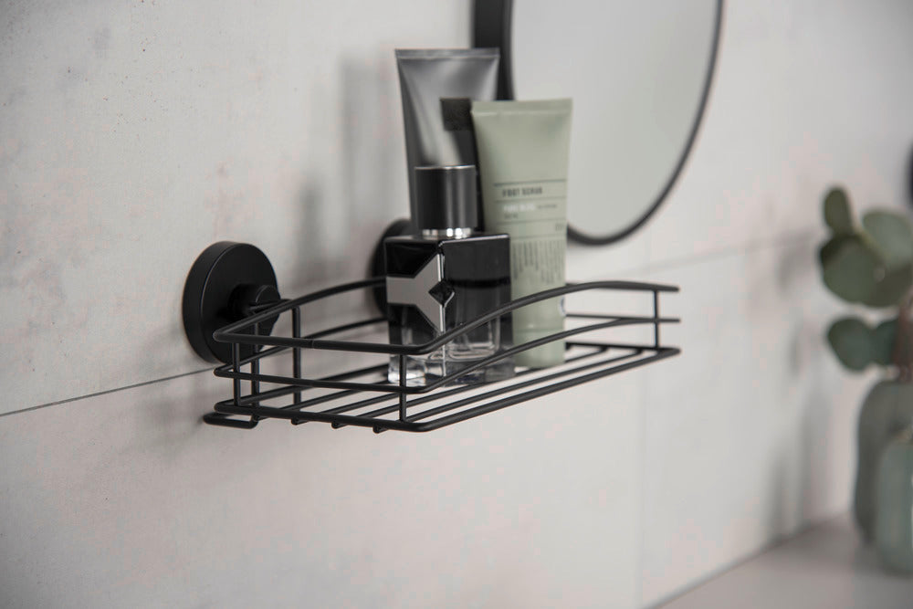 Vegghylle Vacuum-Loc® svart metall i bruk